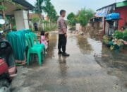 Turut Prihatin, Kapolsek Siak Hulu Sambangi Perumahan Warga Terdampak Banjir