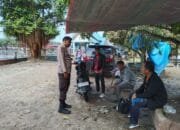 Tak Kenal Lelah, Bhabinkamtibmas Desa Buluh Cina Polsek Siak Hulu Giat Cooling System Pemilu Damai