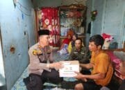 Kapolsek Kempas Bersama Kades Sungai Gantang Berikan Santunan Kepada Keluarga KPPS