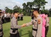 Kapolres Kuansing Pimpin Upacara Pelepasan Purna Bakti Personil Polres Kuansing