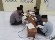 Bhabinkamtibmas Desa Kota Bangun Laksanakan Tadarus Bersama Remaja Masjid