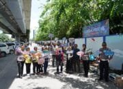 Tim Cooling System Ditlantas Polda Riau Edukasi Pengunjung dan Peserta Lomba Mural Tertib Berlalu Lintas dan Jangan Percaya Hoax