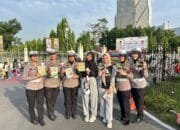 Tingkatkan Kesadaran Masyarakat Saat Berkendara Tim Cooling System Ditlantas Polda Riau Edukasi Pengunjung Car Free Day
