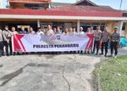 Polresta Pekanbaru dan Polsek Pekanbaru Kota Adakan “Minggu Kasih” Bersama Warga Kelurahan Kota Tinggi