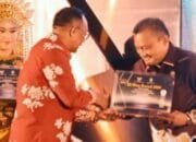 Pemkab Kabupaten Kuansing Meraih Penghargaan PPID Utama Kab/Kota Se-Riau, Pjs Bupati Ajak Perangkat Daerah Optimalkan Keterbukaan Informasi