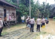 Polsek Kuantan Mudik Update Kondisi Banjir dan Monitoring Debit Air Sungai di Wilayah Hukumnya