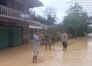 Polsek Hulu Kuantan Lakukan Patroli dan Monitor Banjir Akibat Luapan Sungai Ulo