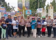 Puluhan Helm SNI Dibagikan Saat Kampanye Keselamatan Berlalu Lintas di CFD Pekanbaru