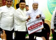 BRK Syariah Salurkan Bantuan CSR untuk Masjid di Kampar dalam Safari Ramadhan