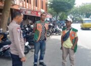 Tertibkan Parkir! Bhabinkamtibmas Sosialisasikan Tarif Resmi ke Warga