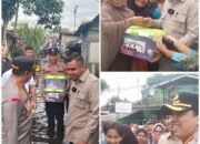 Tinjau Lokasi Banjir, Kapolresta Pekanbaru dan Anggota Komisi III DPR RI Muhammad Rahul Serahkan Bantuan kepada Warga Rumbai