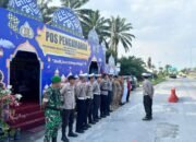 Polisi Siaga di Exit Tol Kandis Utara, Arus Mudik Dipastikan Aman dan Lancar